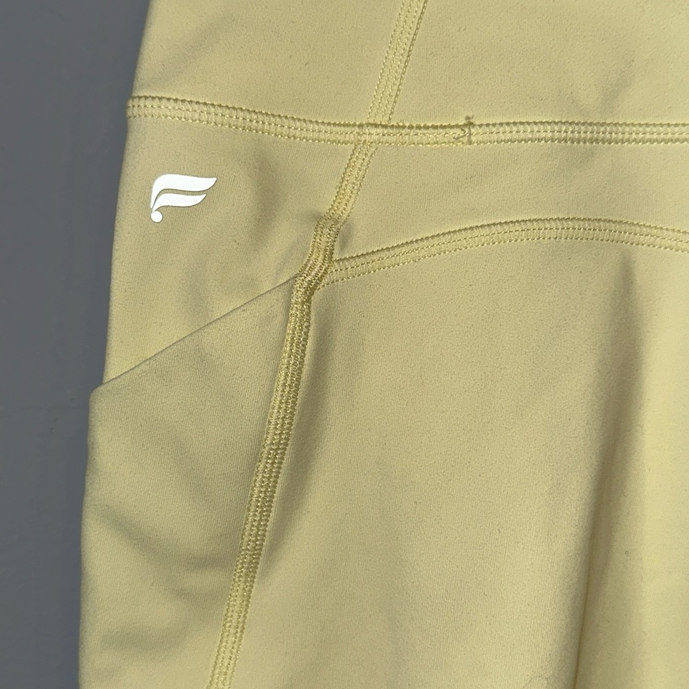 Fabletics Pale Yellow Bike Shorts with Side Pockets - Picture 5 of 6